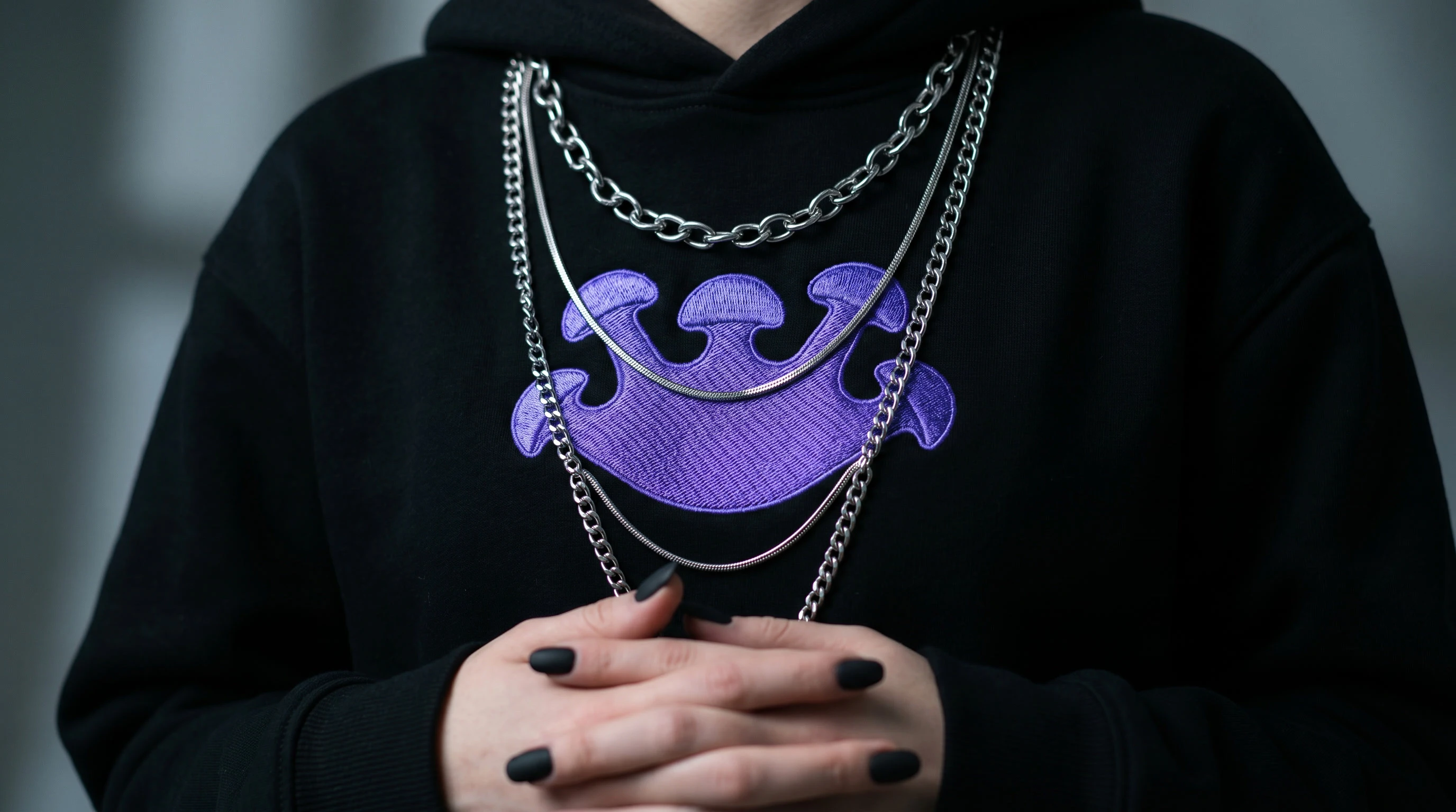nano-banana-2_Close-up_fashion_portrait_of_a_model_wearing_a_black_Gribzer_Team_hoodie_focus_o-3.jpg