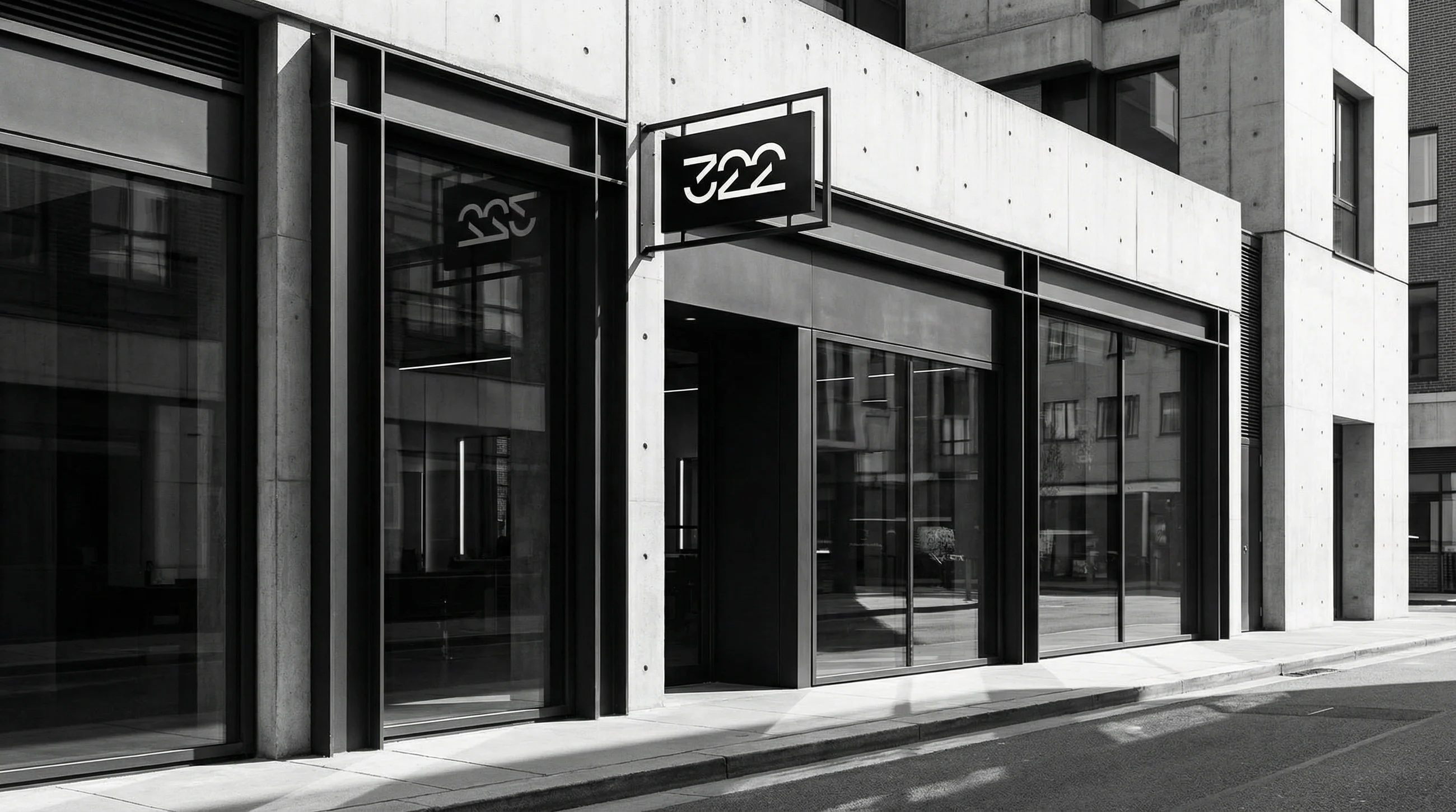 gemini-image-2_A_clean_architectural_exterior_shot_of_a_modern_barbershop_facade._The_322_logo_-1.jpg
