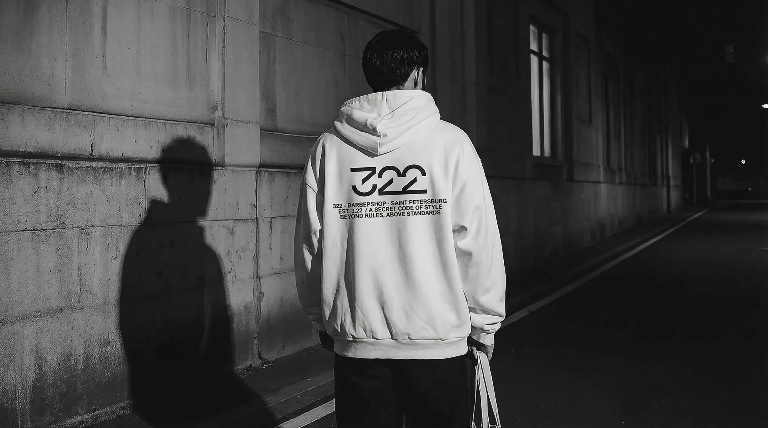 gemini-image-2_A_photorealistic_minimalist_night-street_scene._A_man_stands_with_his_back_to_th-3.jpg