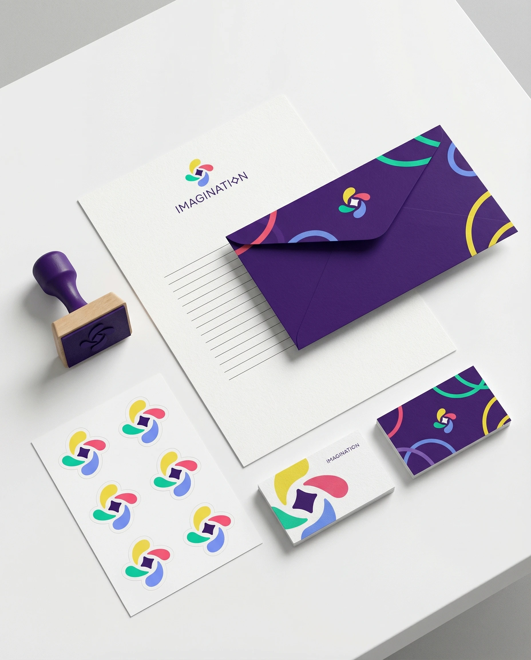 gemini-image-2_Top-down_flat_lay_on_a_clean_white_table_letterhead_envelope_business_cards_stic-3 (1).jpg